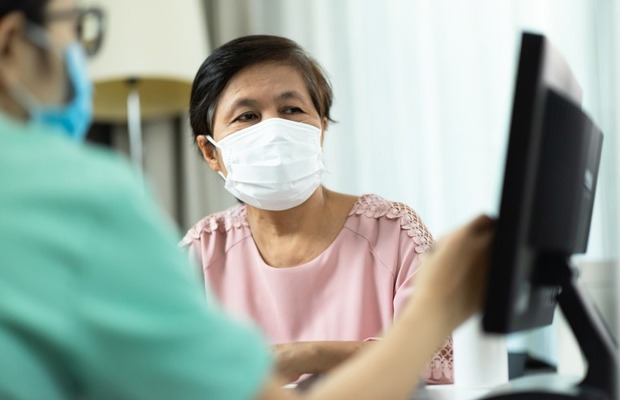 Patient wearing a mask at an appointment