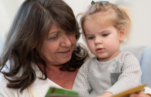 Mother and child reading together.