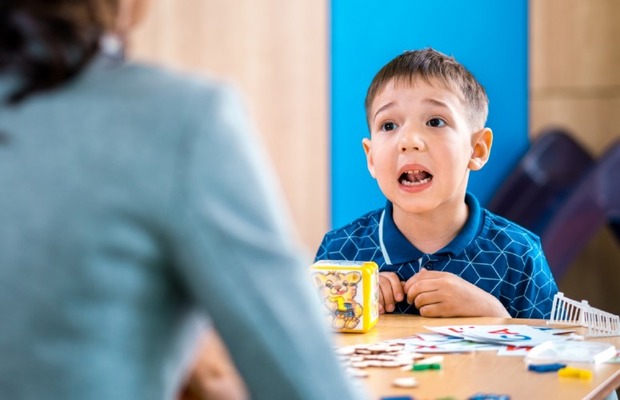 Child playing speech games.