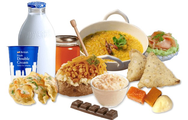 A variety of different food options, including milk, jacket potatoes, curry etc
