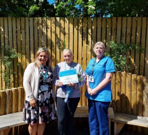 Leanne-Huntington-being-awarded-by-Victoria-Bragshaw-and-Sheila-Sorby