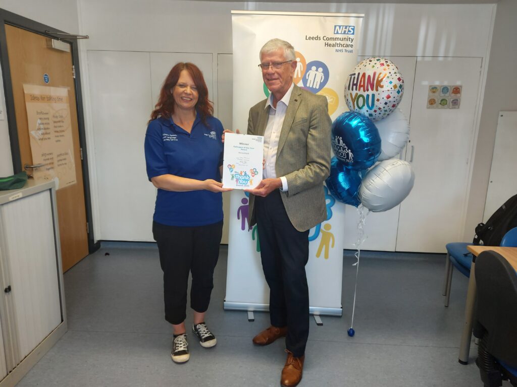 Brodie Clark CBE presents the Colleague of the Year winner Andrea Arnold her award