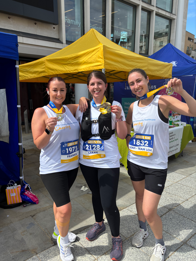 3 LCH employees in running clothes after the Leeds 10k 