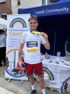 LCH employee in running clothes after the Leeds 10k
