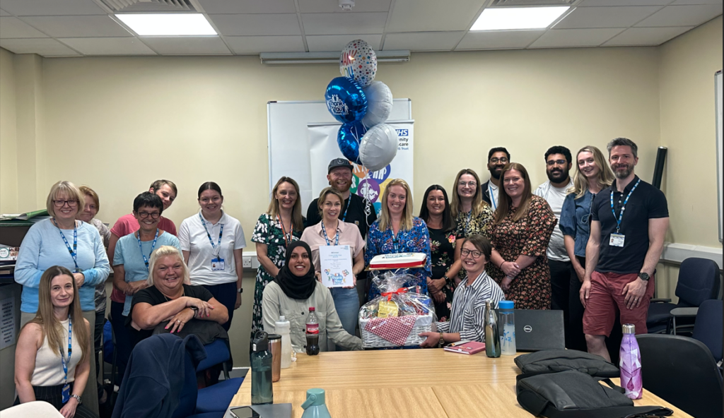 Andrea Osborne presents the Long COVID Rehab Team Team of the Year award at the LCH Thank You Event
