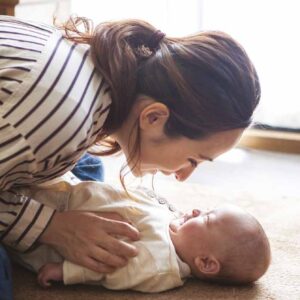 mum and baby playing