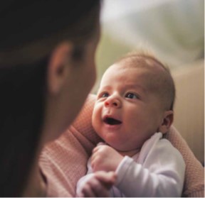 baby and mother playing
