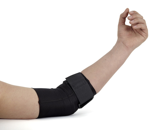  A person wearing a black elbow brace, illustrating support for cubital tunnel syndrome.