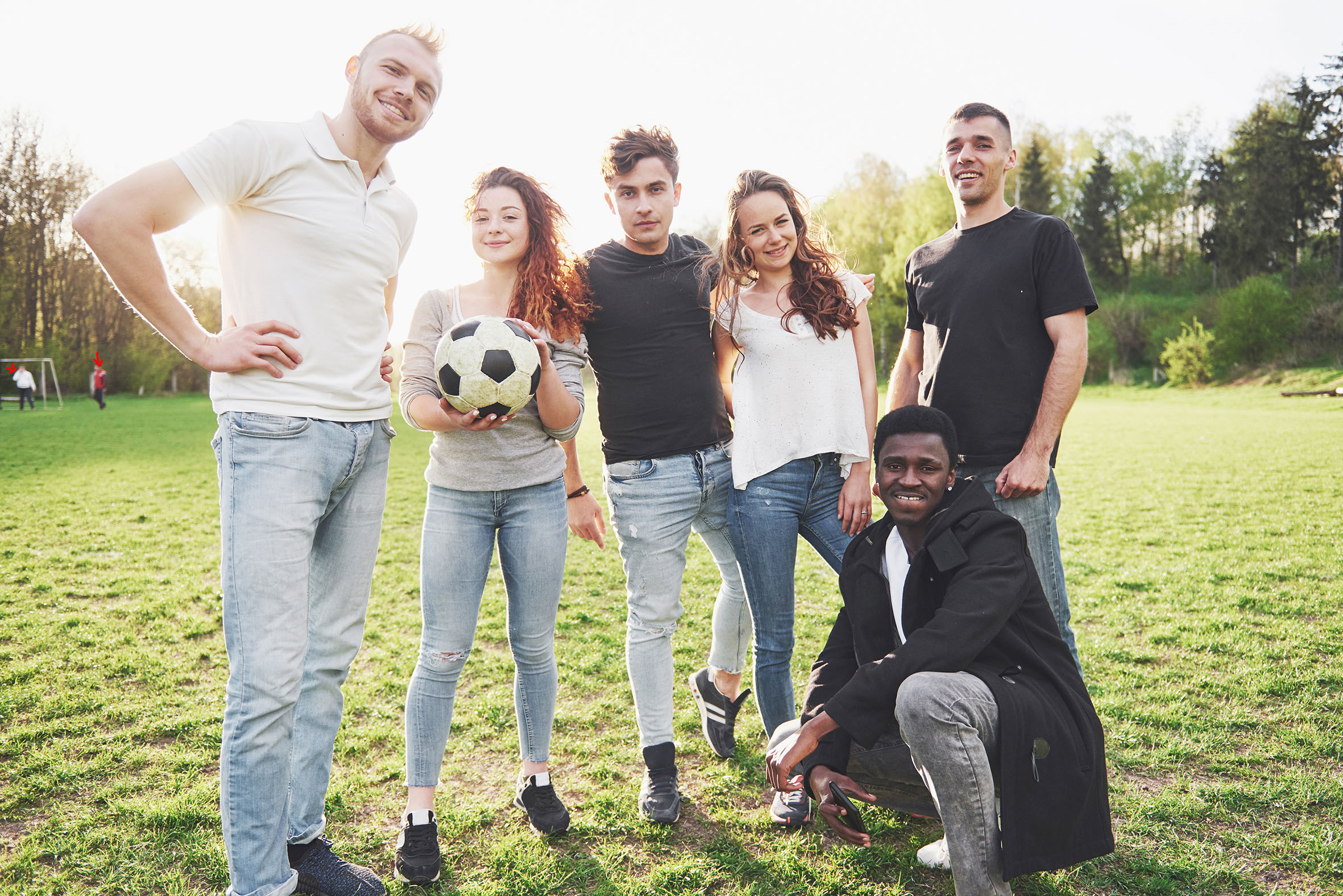 group of friend on a football field