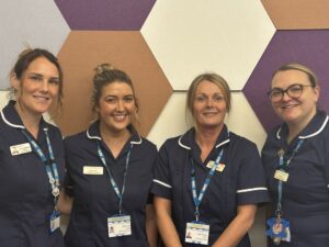 4 nurses from the stoma team standing side by side