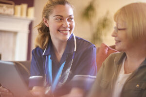Junior nurse comes to see one of her patients at home